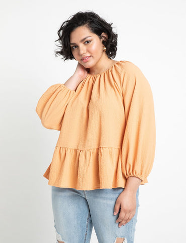 Raglan Peplum Blouse in Soft Orange